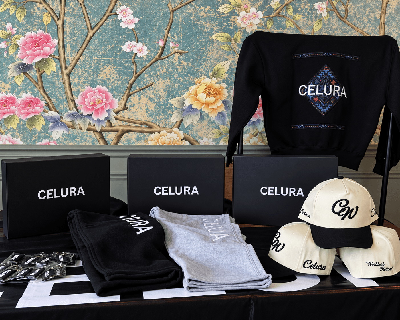 Celura clothing, caps and packaging on display